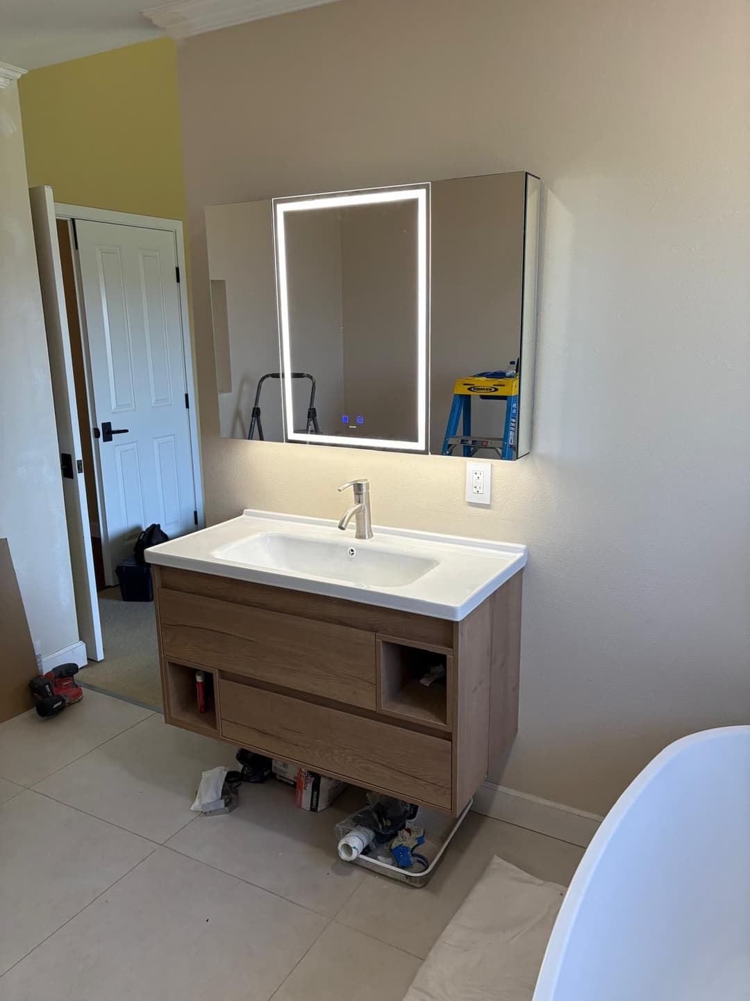picture of  newly remodeled kitchen bathroom with bathroom lights and fixtures