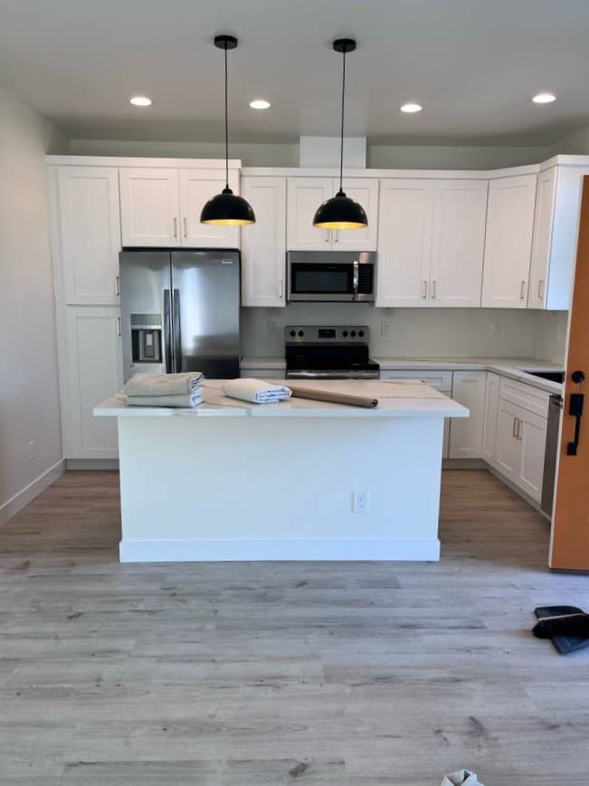 picture of  newly remodeled kitchen with custom lights and cabinets